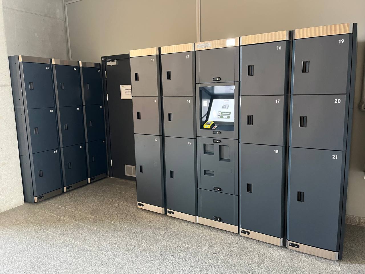 Automatic luggage locker with touchscreen terminal and compartments of different sizes